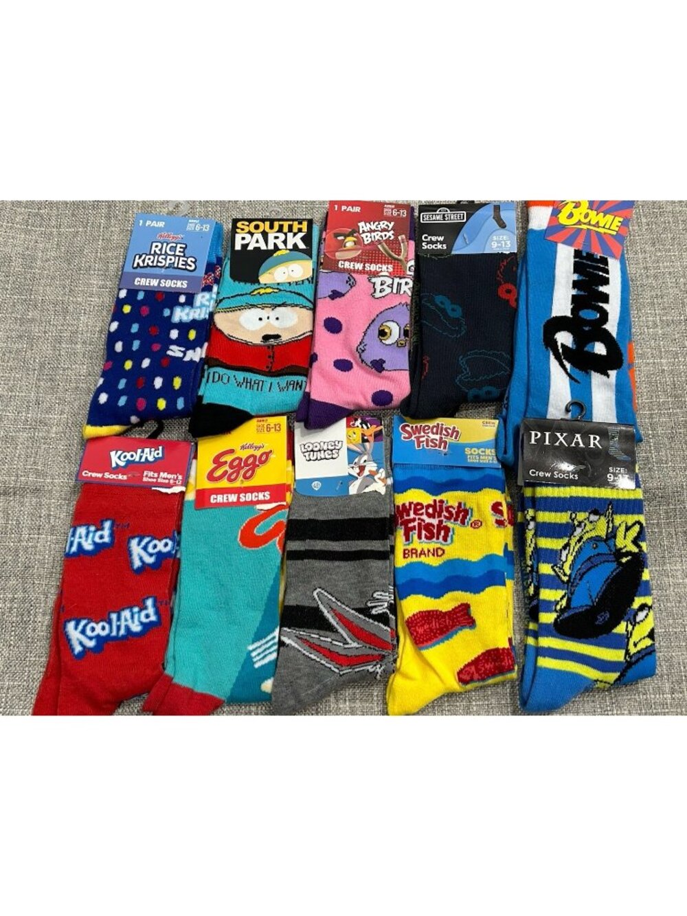 Lot of 10 Novelty Crew Socks Pop Culture Bowie Koolaid South Park Rice Krispies